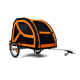 Ein schwarzer und orangefarbener Haustieranhänger mit Netzfenstern, entworfen für den Transport von Haustieren, mit einem stabilen Rahmen und Rädern.