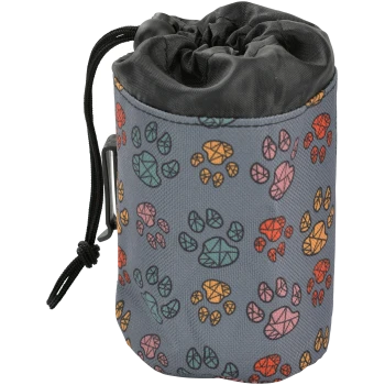 A cylindrical pet treat pouch with a drawstring closure, featuring a gray background adorned with colorful paw prints in orange, pink, and teal.