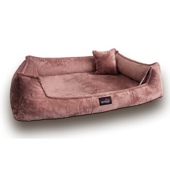 Ein plüschiges, rechteckiges Haustierbett in sanftem Rosa, mit erhöhten Rändern und einem kleinen passenden Kissen, markiert mit "tierlando."