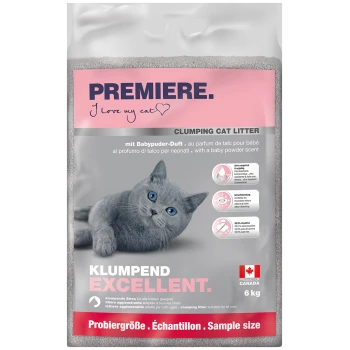 Packung klumpendes Katzenstreu mit einer grauen Katze mit blauen Augen, beschriftet mit "PREMIERE. Ich liebe meine Katze" und "KLU MPEND EXCELLENT." in Pink.