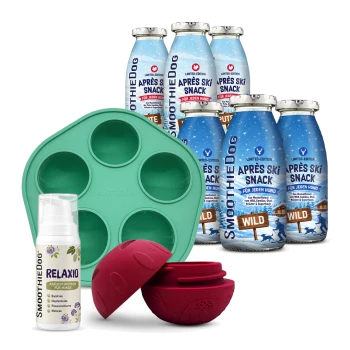Sechs SmoothieDog 'Après Ski Snack (Wild)'-Flaschen, grüne 6-Fach-Silikonform, rote Silikon-Leckerballhälften und eine Relaxio-Flasche.
