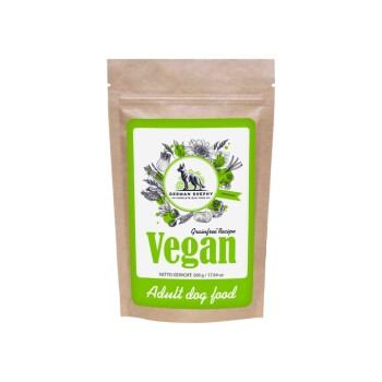 Veganes Hundefutter für Erwachsene in einer 500g Kraftpapier-Tüte mit grünem und weißem Etikett, das eine Hundillustration und ein florales Design zeigt.