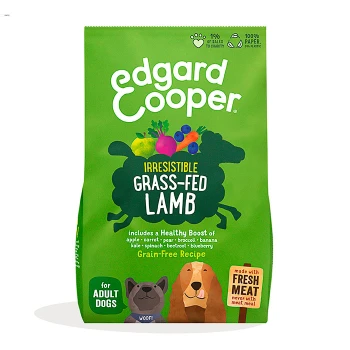 Green bag of Edgard Cooper dog food labeled "Irresistible Grass-Fed Lamb," featuring veggies, fruits, and a grain-free recipe for adult dogs.