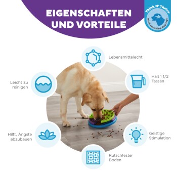 Ein Labrador frisst aus einer bunten interaktiven Schüssel, die dazu entworfen wurde, Angst zu reduzieren, den Geist zu stimulieren und leicht zu reinigen ist.