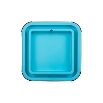 Eine Draufsicht auf eine quadratische, leuchtend blaue Haustierschüssel mit einem leicht erhöhten Rand und einem kleinen Loch in der Mitte.