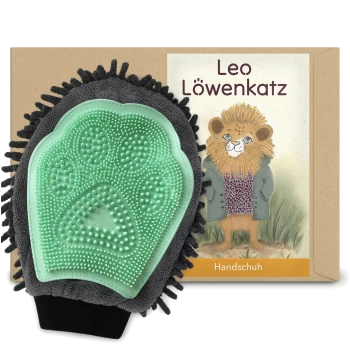 Grüner Pfoten-förmiger Pflegehandschuh mit strukturierter Oberfläche, neben einer Cartoon-Löwenfigur auf einer braunen Verpackung mit der Aufschrift "Leo Löwenkatz" und "Handschuh."