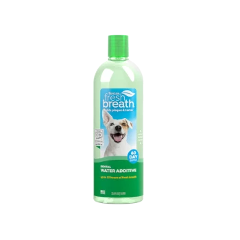 TropiClean Fresh Breath water additive bottle for dogs, green liquid and smiling white dog; label reads "fresh breath" and "60 day supply".