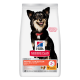 Sac d'aliments pour chiens Hill's Science Plan Perfect Digestion avec chien noir souriant, recommandé par les vétérinaires, poulet et riz brun.