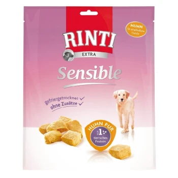 Emballage de friandises pour chiens Rinti Extra Sensible avec du poulet lyophilisé, une image de chiot, et les textes 'Huhn pur' et '1a tierisches Protein'.