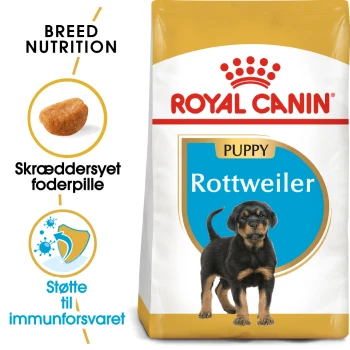 Royal Canin Rottweiler Welpenfutterbeutel mit einem Rottweiler-Welpen, mit Text, der die Ernährungsbedürfnisse der Rasse und die Unterstützung des Immunsystems hervorhebt.