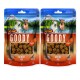 Deux paquets de friandises pour chiens DeliBest Goody, présentant des collations à base de viande fraîche, semi-humides et sans céréales, avec un fond de montagne pittoresque.