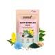 noms+ Beutel mit der Aufschrift 'HAUT-KOMPLEX' Hautergänzung für Hunde mit Blumen, grünem Pulver, Samen und Kichererbsen.