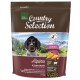 Braune Hundefuttertüte mit einem Hund auf der Vorderseite, beschriftet mit "Real Nature Country Selection Alpine," mit Zutaten, die auf Deutsch und Englisch aufgelistet sind.