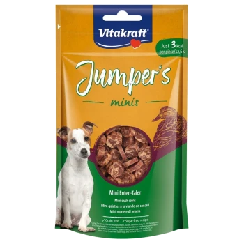 Orangefarbene Tüte Vitakraft Jumper's Minis Hundeleckerlis mit Mini-Enten-Münzen, die "Nur 3 kcal pro Stück" und einen kleinen Hund neben dem Fenster zeigt.