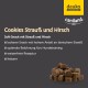 Weiche Hundesnacks mit der Bezeichnung "Cookies Strauß und Hirsch", die einen hohen Proteingehalt, ein weizenfreies Rezept und wenig Fett aufweisen, mit einem Haufen Leckerlis.
