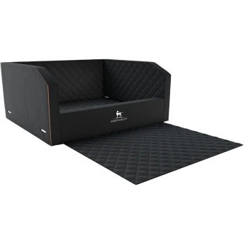 Schwarzes, gestepptes Hundebett mit einer abnehmbaren Matte, mit einer erhöhten Rücken- und Seitenpartie und dem Logo "KNUFFELWUFF" deutlich sichtbar.