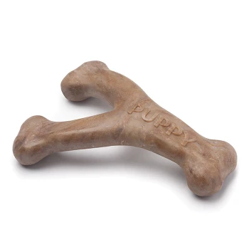 A brown rubber puppy chew toy shaped like a bone, with the word "PUPPY" embossed on its surface.