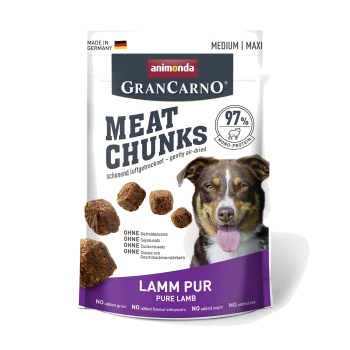 Hundefutterverpackung mit GranCarno Fleischstücken, 97% Monoprotein, mit einem lächelnden Hund und "Lamm Pur" ohne Getreide oder Zusatzstoffe.