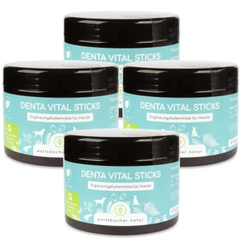 Vier Gläser "Denta Vital Sticks" für Hunde, mit einem hellblauen Etikett mit Text auf Deutsch, das anzeigt, dass es sich um ein Ergänzungsfuttermittel handelt.