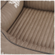 Eine Nahaufnahme eines plüschigen, beigen Haustierbettes mit einem gerippten Design und gepolsterten Seiten, ideal für den Komfort von Haustieren.