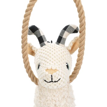 Ein plüschiges Ziegenspielzeug mit einem Seilgriff, mit einem strukturierten weißen Körper, karierten schwarz-weißen Hörnern und einem freundlichen Gesicht.