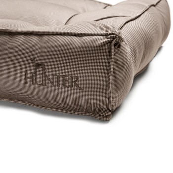 Braches Hundebett mit kariertem Muster, das das geprägte Logo 'HUNTER' und eine Hundesilhouette zeigt.