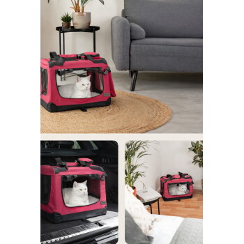 Weiße Katze ruht in einer rosa, weichwandigen Tragetasche mit Netz auf einem runden Jute‑Teppich neben einem grauen Sofa.