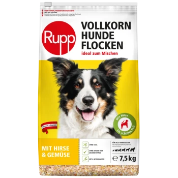 Hundefutterverpackung mit einem lächelnden Hund, beschriftet mit "Rupp Vollkorn Hunde Flocken", ideal zum Mischen, mit Hirse und Gemüse für alle Rassen.