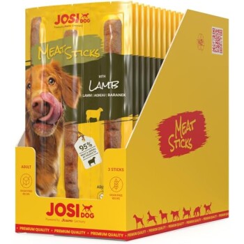 Verpackung für Hundeleckereien mit 'Fleischstangen mit Lamm', die einen Golden Retriever zeigt, der sich die Lippen leckt. Enthält 95% Fleisch und tierische Nebenprodukte.