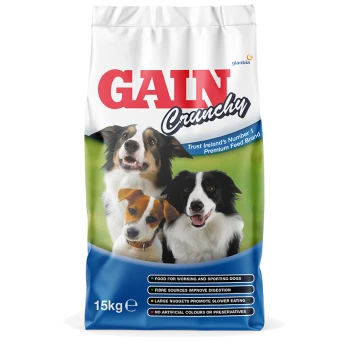 A 15kg bag of GAIN Crunchy dog food featuring three dogs on the front, with text highlighting it as Ireland's number 1 premium feed brand.
