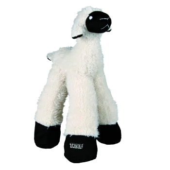 Ein plüschiges Schäferhundspielzeug mit einem flauschigen weißen Körper und schwarzem Gesicht und Hufen, mit dem Markennamen "TRIXIE" auf einem Huf.