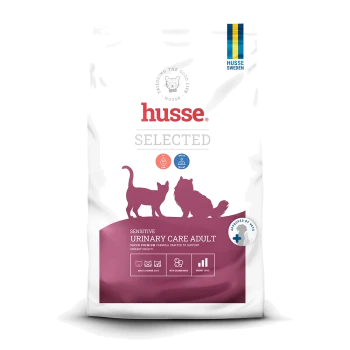 Katze Futterbeutel mit der Aufschrift "Urinary", mit einer Katzenillustration, und Text, der Vorteile für die Harnwegsgesundheit, niedrigen pH-Wert und Magnesium hervorhebt.