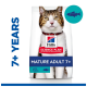 A cat with a collar is featured on a bag of Hill's Science Plan cat food, labeled "Mature Adult 7+" with tuna, and marked as veterinarian recommended.