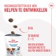 Royal Canin Training Treats verpakking met hondenafbeelding, met tekst over DHA en vitamines C + E voor een gezonde hersenfunctie.