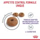 Croquettes pour chiens étiquetées 'Appetite Control Formule Unique' avec des détails sur la teneur en protéines et en graisses, contenant de la L-Carnitine.