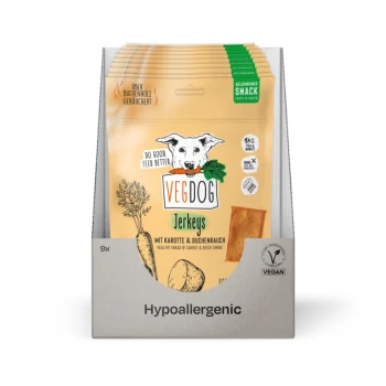 Vegdog Jerkeys Verpackung mit einer Hundillustration, mit dem Text "Do good. Feed better." und "Mit Karotte & Buchenrauch" auf der Vorderseite.