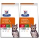 Dwie torby karmy dla kotów Hill's Prescription Diet oznaczone "Urinary Stress + Metabolic," z szarym kotem tabby na przodzie.