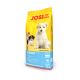 Gelber "JOSI DOG" Futterbeutel von Josera, zeigt drei Welpen, beschriftet mit "JUNIOR (25/13)" und "DEUTSCHE QUALITÄT."