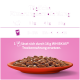 Schüssel mit Katzenfutter auf einem lila Hintergrund, der Fütterungsempfehlungen für 3 kg, 4 kg und 5 kg Katzen zeigt: 16 g WHISKAS® pro Portion.