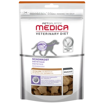 Die Verpackung von PetBalance Medica Hundesnacks zeigt eine Hundesilhouette, beschriftet mit "Schon kost" und "Snacks," mit Zutaten wie Truthahn und Reis.