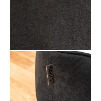 Nahaufnahme eines weichen schwarzen Haustierbetts mit einem Etikett, das den Markennamen "lionto" zeigt. Die Textur wirkt plüschig und einladend.