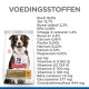 Hondenvoer verpakking met een border collie, met voedingsinformatie inclusief eiwitten, vetten, vitamines en mineralen vermeld in het Nederlands.
