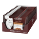 Schachtel mit Purina Gourmet A la Carte Portionsbeuteln, mit Foto einer weißen, langhaarigen Katze und dem Schriftzug 'Rezepte des Küchenchefs' sichtbar.
