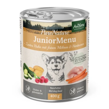 Eine Dose PureNature JuniorMenu Nassfutter für Hunde mit einem Hundegrafik, die Huhn, Karotten und Himbeeren zeigt. 400 g, gluten- und getreidefrei.