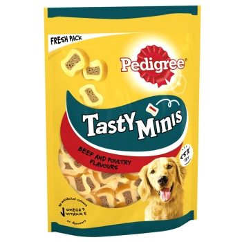 A bright yellow bag of Pedigree Tasty Minis dog treats featuring a golden retriever, labeled "Beef and Poultry Flavours."
