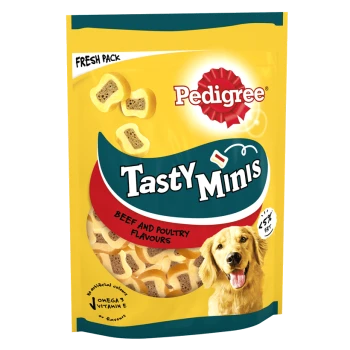 A bright yellow bag of Pedigree Tasty Minis dog treats featuring a golden retriever, labeled "Beef and Poultry Flavours."
