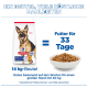Hill's Science Plan 14-kg-Hundefuttertüte (Deutscher Schäferhund) neben einem Napf mit Futter — 'Futter für 33 Tage'.