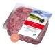 Verpacktes rohes Rindfleisch für Hunde, gekennzeichnet mit "proCani buy nature", mit einem rot-weißen Design und dem Text "Rindfleisch pur" und "Pure Beef."