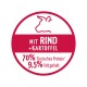 Etikett mit einer Kuhsilhouette und dem Text "Mit Rind + Kartoffel", das 70 % tierisches Protein und 9,5 % Fettgehalt angibt.
