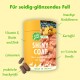 Gelbe Verpackung für "Shiny Coat" Hundepflege listet Lachs, Kartoffeln, Heidelbeeren und Leinsamen auf und hebt die Vitamine E, Biotin und Zink hervor.
